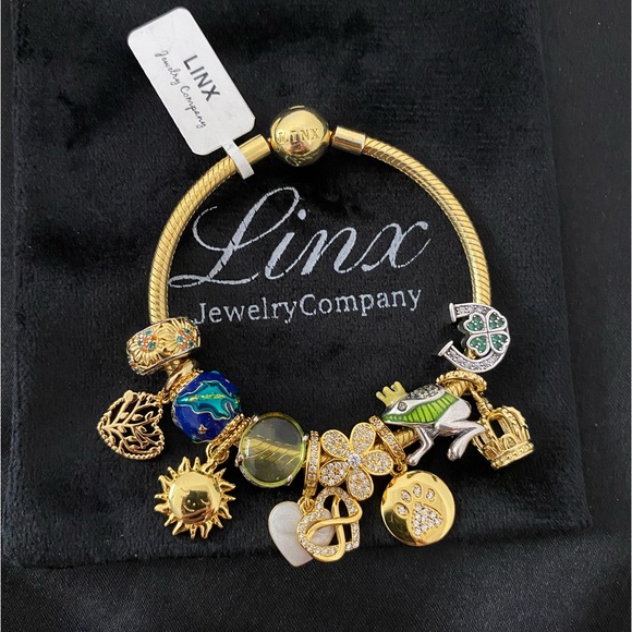 Linx Yellow Gold Bracelet with Gold and Green Themed Charms